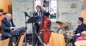 27th December 2015. The New York Jazz Trio playing for brunchers at Blenheim Palace, Oxfordshire. Mike, piano, Geoff Tooley, double bass and Stuart Russell, drums. Photo by Barry Wheatlley.